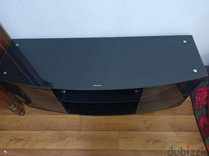 black glass tv cabinet in good  condition 2