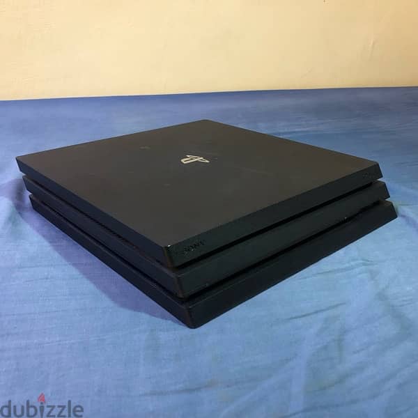 Ps4 Pro 1Tb with a controller and 2 discs (Negotiable) 3