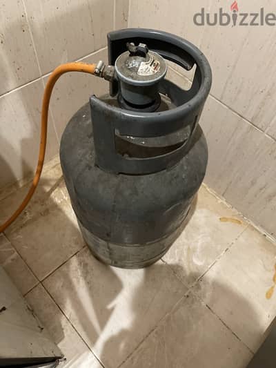 Gas Cylinder alongwith the Regulator and 2 meters pipe