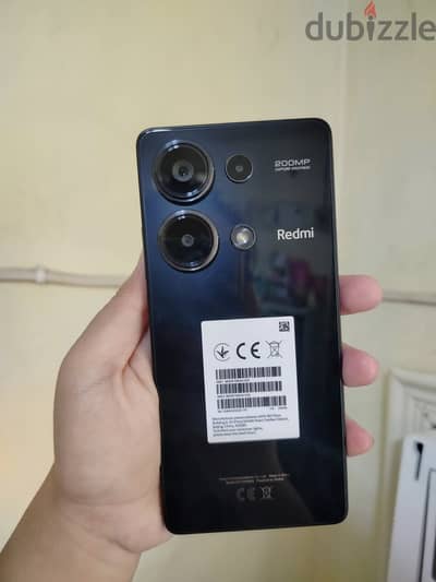 Xiaomi Redmi Note 13 Pro with accessories