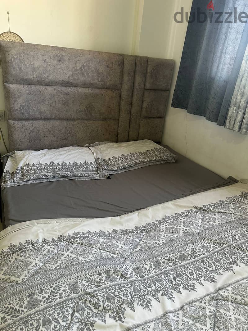 Double bed and three door cupboard good condition 1