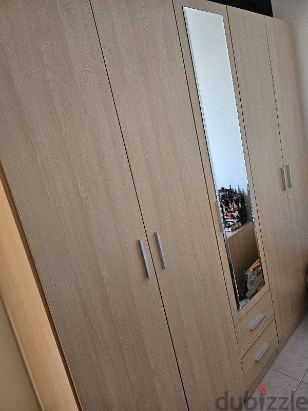 wardrobe with a dressing mirror and two side table 1