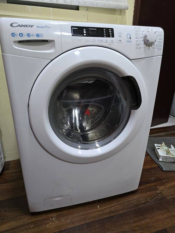 Candy 8kg front loading smart washing machine for sell 0