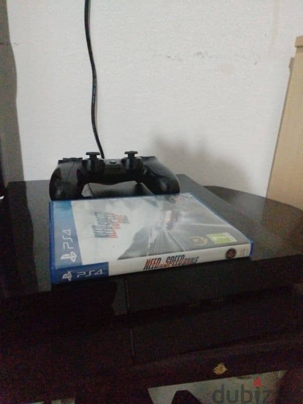 play station 4 for sale and 1 joystick and one game need for speed 0