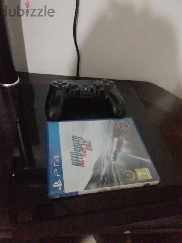 play station 4 for sale and 1 joystick and one game need for speed 1