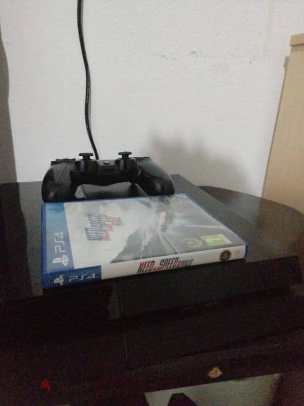 play station 4 for sale and 1 joystick and one game need for speed 3