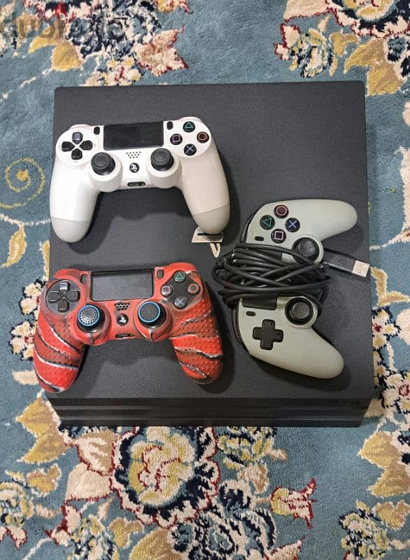 PS4 PRO 1TB IN BEST CONDITION FOR SALE WITH 3 CONTROLLERS 1