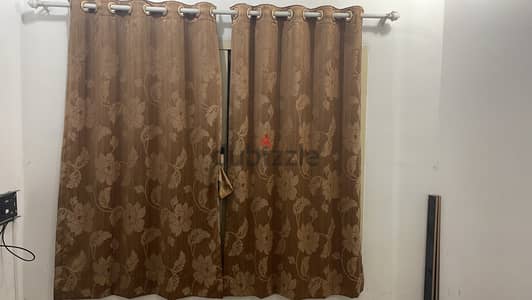 7 window curtains & 3 Rods like new is available for sale