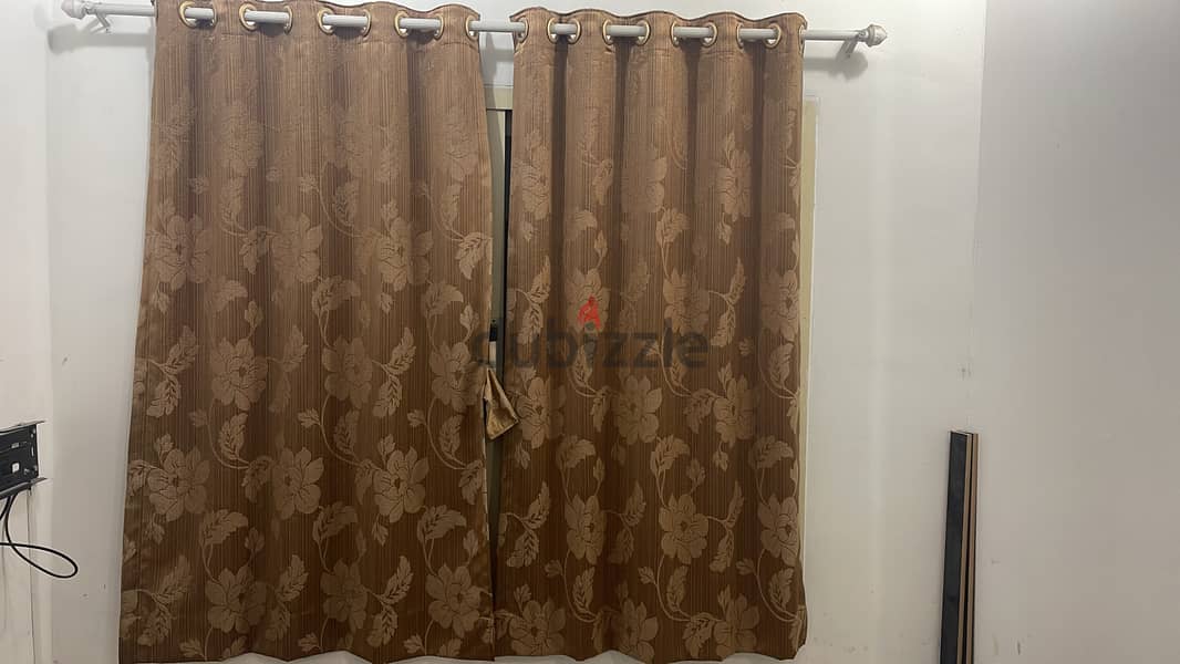 7 window curtains & 3 Rods like new is available for sale 0