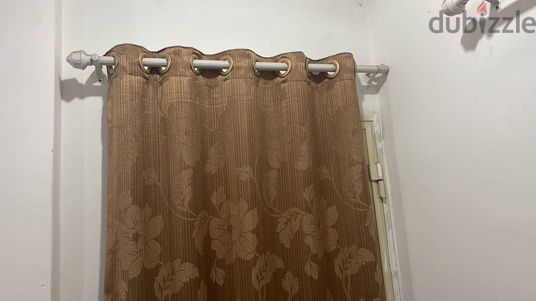 7 window curtains & 3 Rods like new is available for sale 2