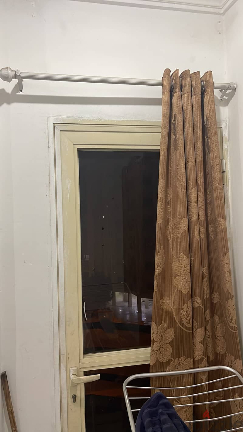 7 window curtains & 3 Rods like new is available for sale 3