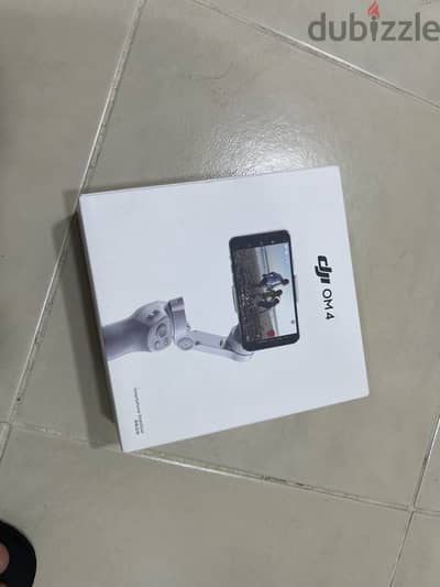 DJI OM 4 - Handheld 3-Axis Smartphone Gimbal Stabilizer with Grip