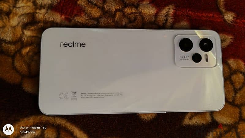 realme c35. . . 25 kd 0