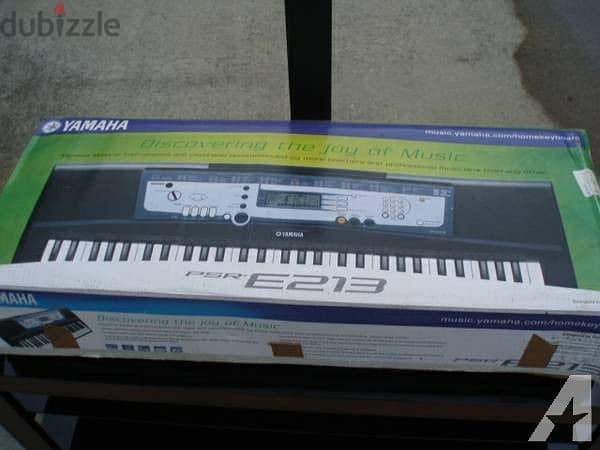 Yamaha Portatone PSR E213 Portable Keyboard w/stand for sheet music 1