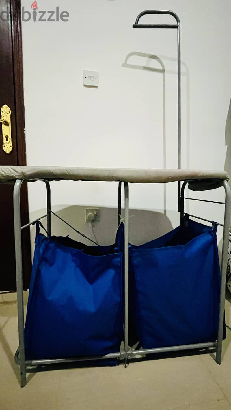 Used iron table with storage. Used Floor lamp from Homecentre 0