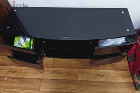 black glass tv cabinet and glass shelf in good condition