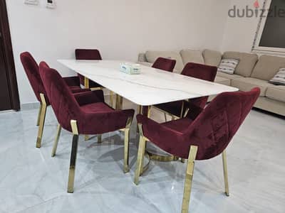 Marble dining table with 6  chairs like new