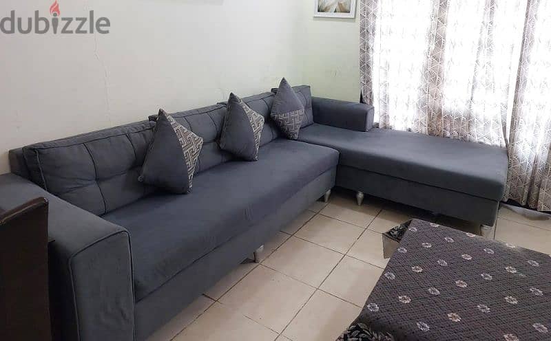 A big size sofa in grey colour in excellent condition 0