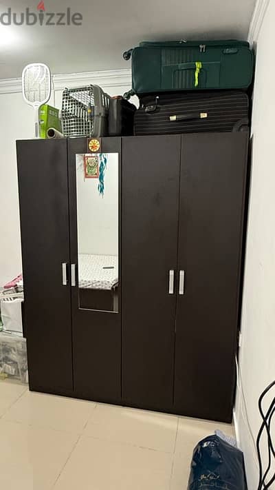 4 Door Wardrobe. Dark brown color bought from HomeCenter