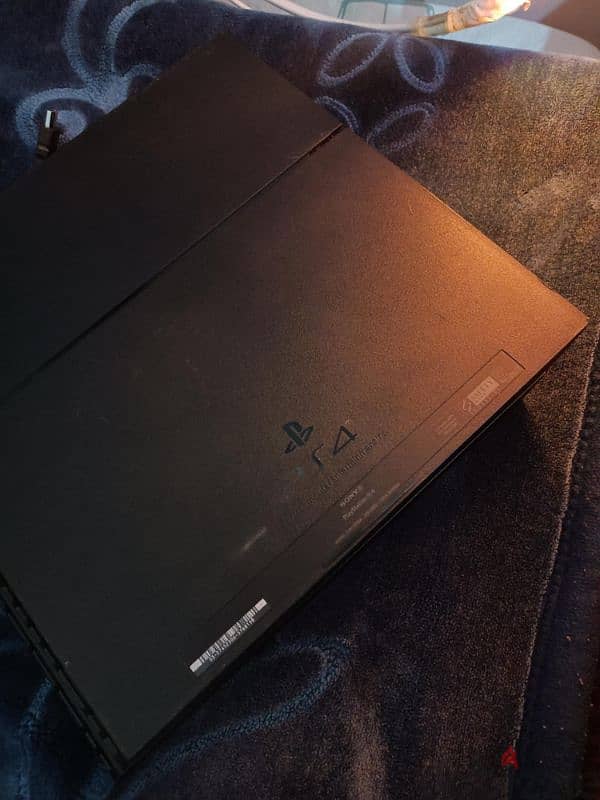 Playstation 4 with 2 games (Negotiable) 3