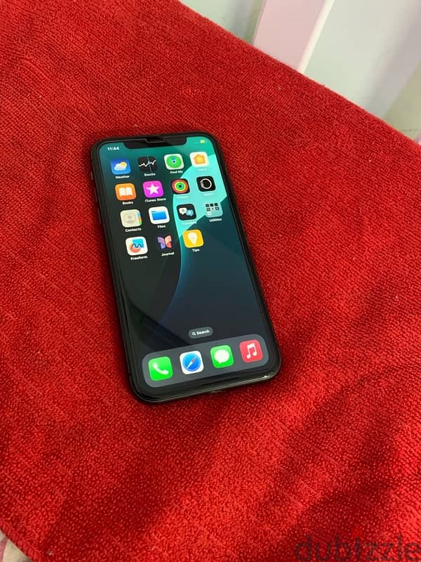 iPhone 11 . . 128gb battery 85% not open device 100% waterproof device 9