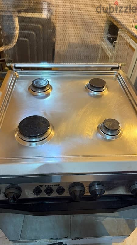 4 Burner Aftron with Grill and Oven. 7