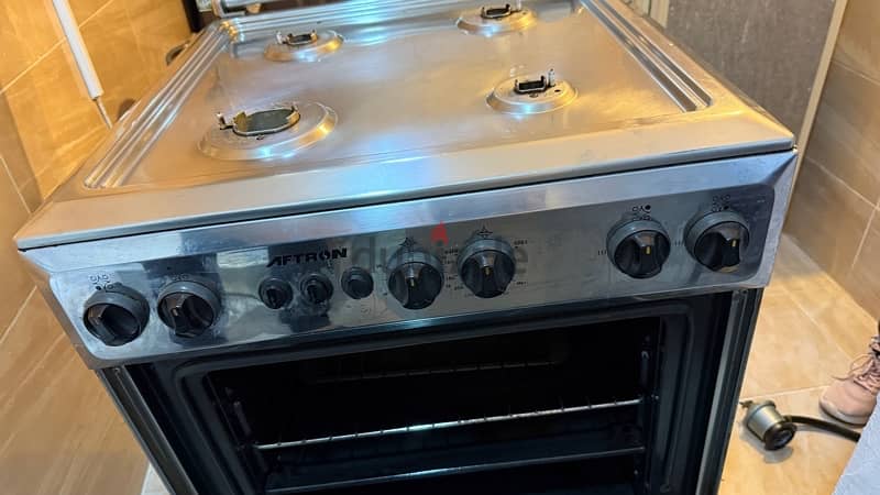 4 Burner Aftron with Grill and Oven. 9