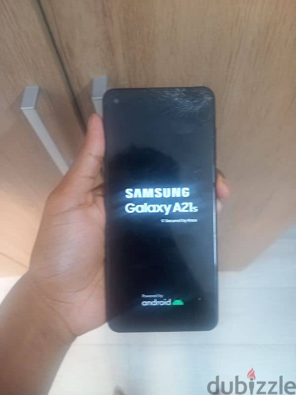 Samsung a21s 64gb (works perfectly js the top right screen is craked) 1