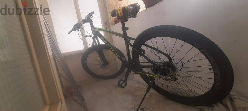 HARDTIL MOUNTAIN BIKE WITH SUSPENSION, GEARS AND SIZE MEDIUM 11