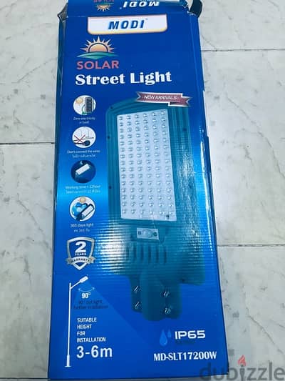 2 solar lights for sale with box and remote