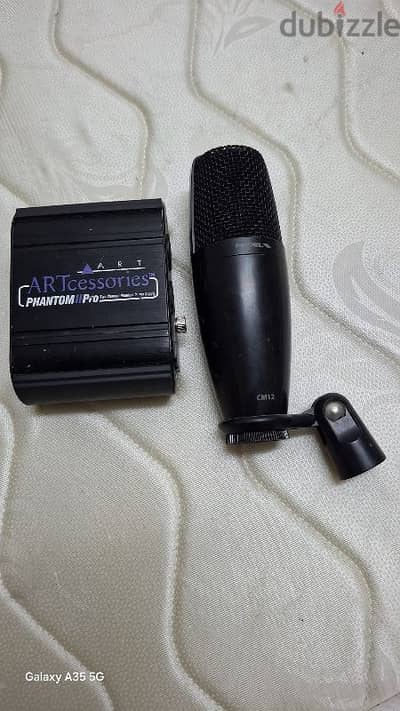 proel studio microphone and phantom pawer supply