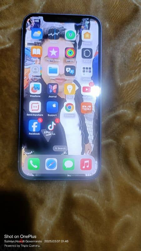 salmiya iPhone 12 storage 128 gb good condition all original 5