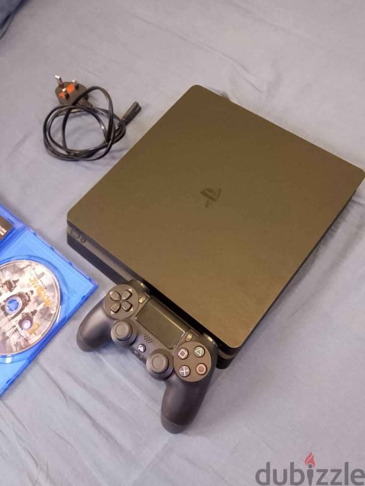 PS4 Slim 1TB in working condition, no issues at all, with 1 game. 3