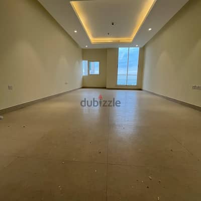 Semi-furnished apartment with a balcony sea view for rent in Salmiya