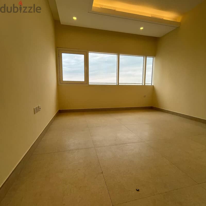 Semi-furnished apartment with a balcony sea view for rent in Salmiya 1