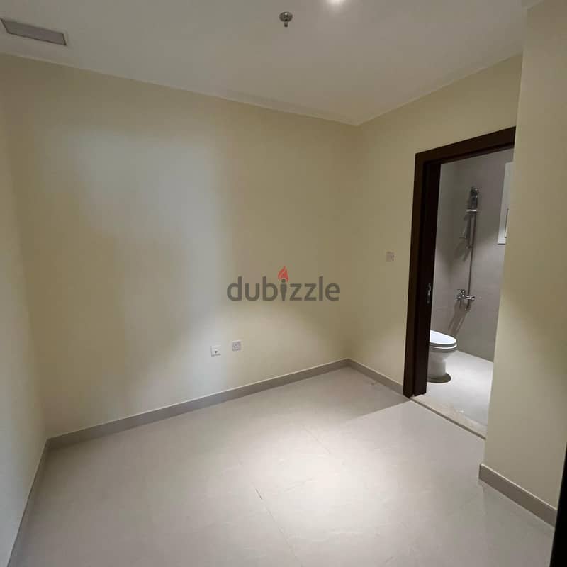 Semi-furnished apartment with a balcony sea view for rent in Salmiya 8