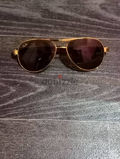 GOLD RAYBAN GALSSES