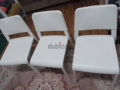 Ikea white heavy chairs and corner drower