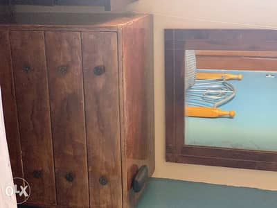 Wooden dresser with mirror