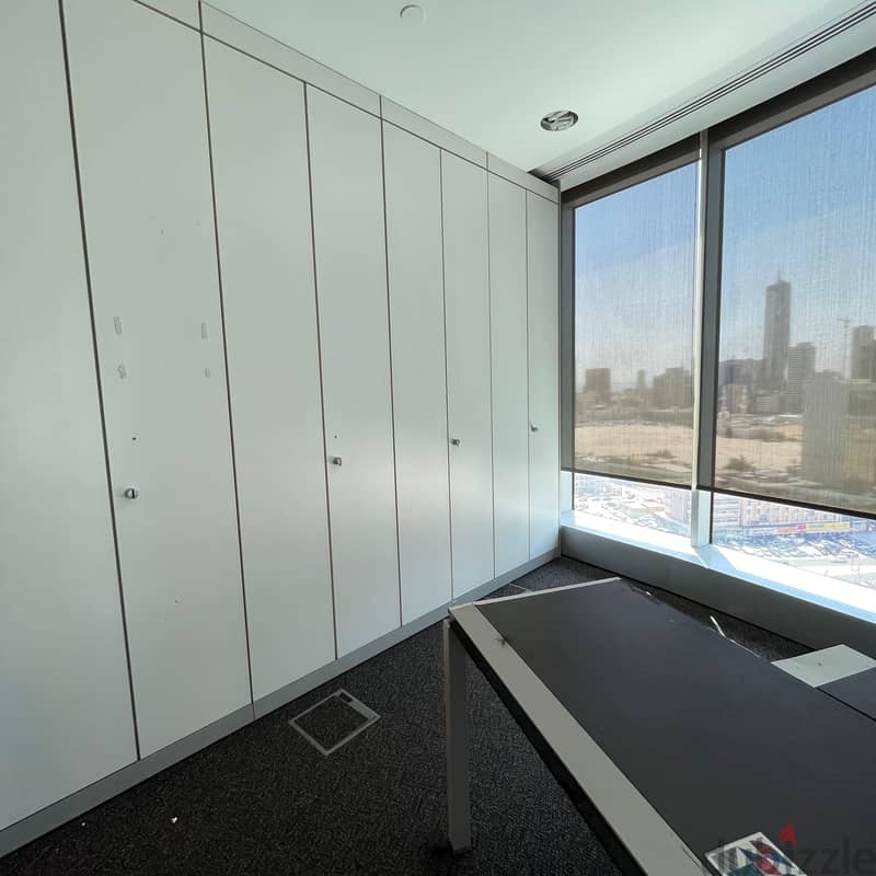 Half a floor of commercial space for rent in sharq Block 7 2