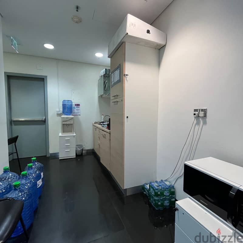 Half a floor of commercial space for rent in sharq Block 7 3