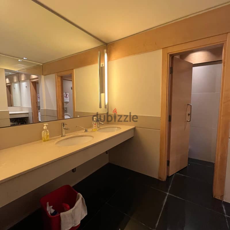 Half a floor of commercial space for rent in sharq Block 7 5