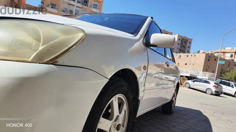 Mitsubishi Lancer 200664280832009858125