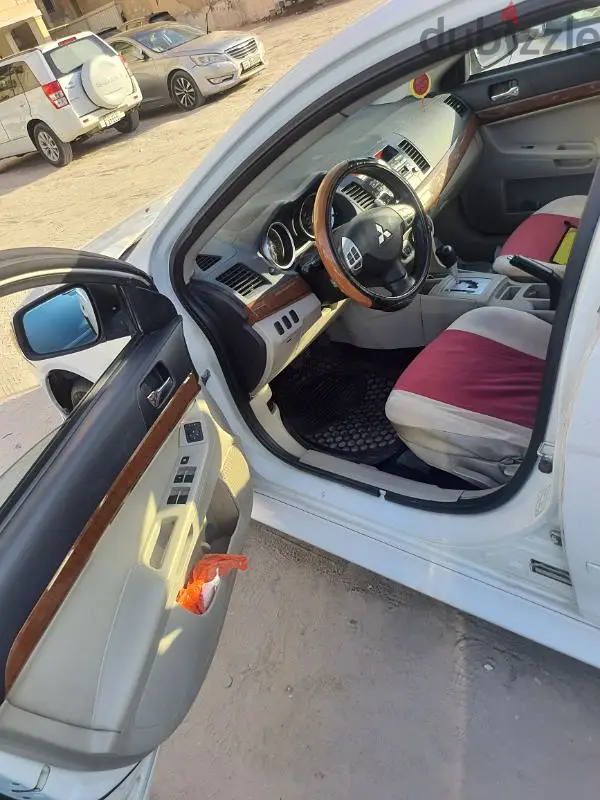 lancer 2012 good conditon لانسر ٢٠١٢ بحاله جيده64521557527682127
