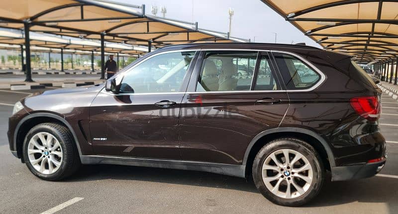 BMW V⁶ماشى132 الف٦ سلندر،موديل 201٤،بحالة ممتازة جدا 4