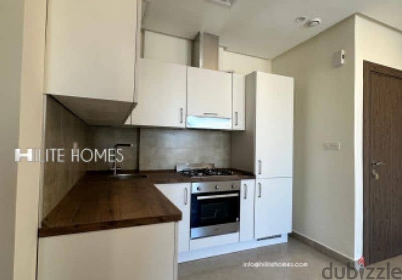 Stylish new one-bedroom semi-furnished apartment in Salmiya 6