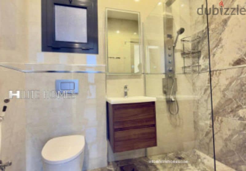 Seaview 2 bedroom semi furnished apartment for rent in Sabha Al Salem 6