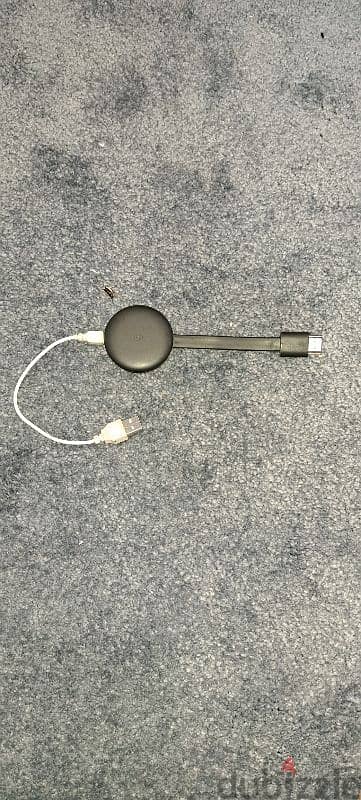 Google Chromecast, a device used for streaming media to a TV. 1