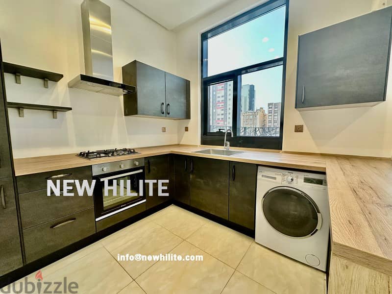 Modern 2-Bedroom Apartment with Balcony for Rent in Sabah Al Salem 4