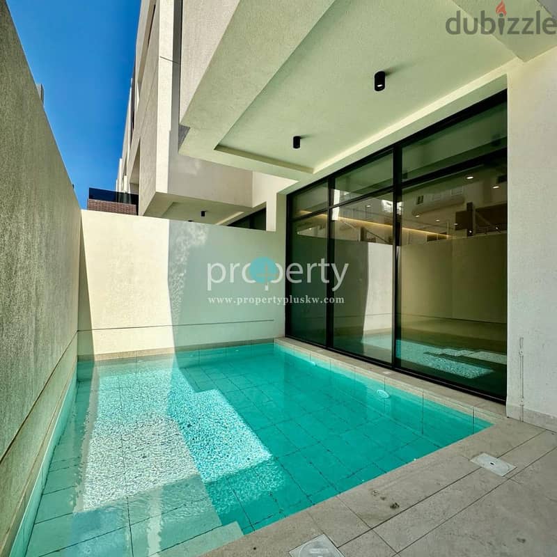 Spacious 5BR Townhouse with Pool & Rooftop in Abu Fatira 1